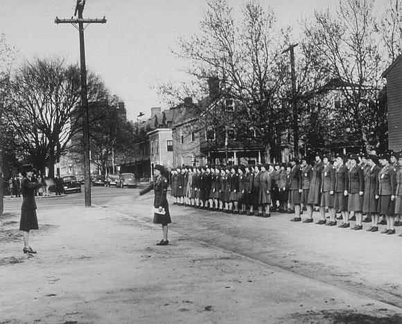Image shows a group of women standing in line (image courtesy of the U.S. Army Signal Corps Photograph Collection, Library of Virginia)