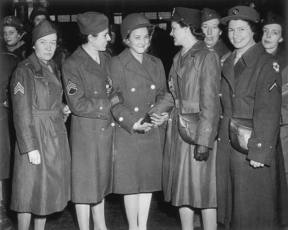 Image shows a group of women standing beside one another in uniform (image courtesy of the U.S. Army Signal Corps Photograph Collection, Library of Virginia)