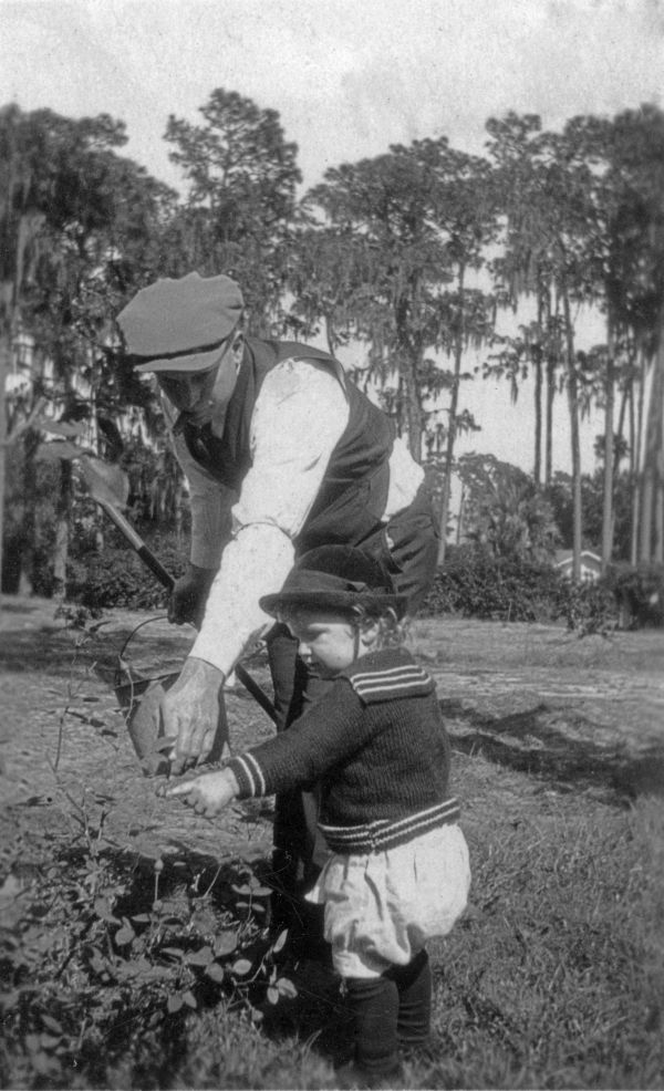 Image shows a man gardening with his young son (image courtesy of the Altamonte Springs Collection, State Archives of Florida)