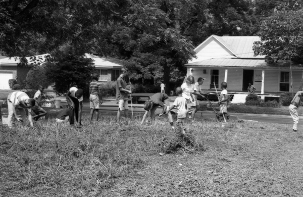 Image shows children and adults working in a community garden (image courtesy of the Tallahassee Democrat Collection, State Archives of Florida)